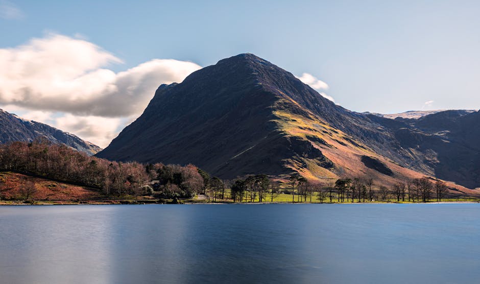 Lake District fells and mountains rising above a river valley